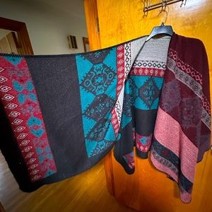 Multicolored poncho/ thrown over sweater